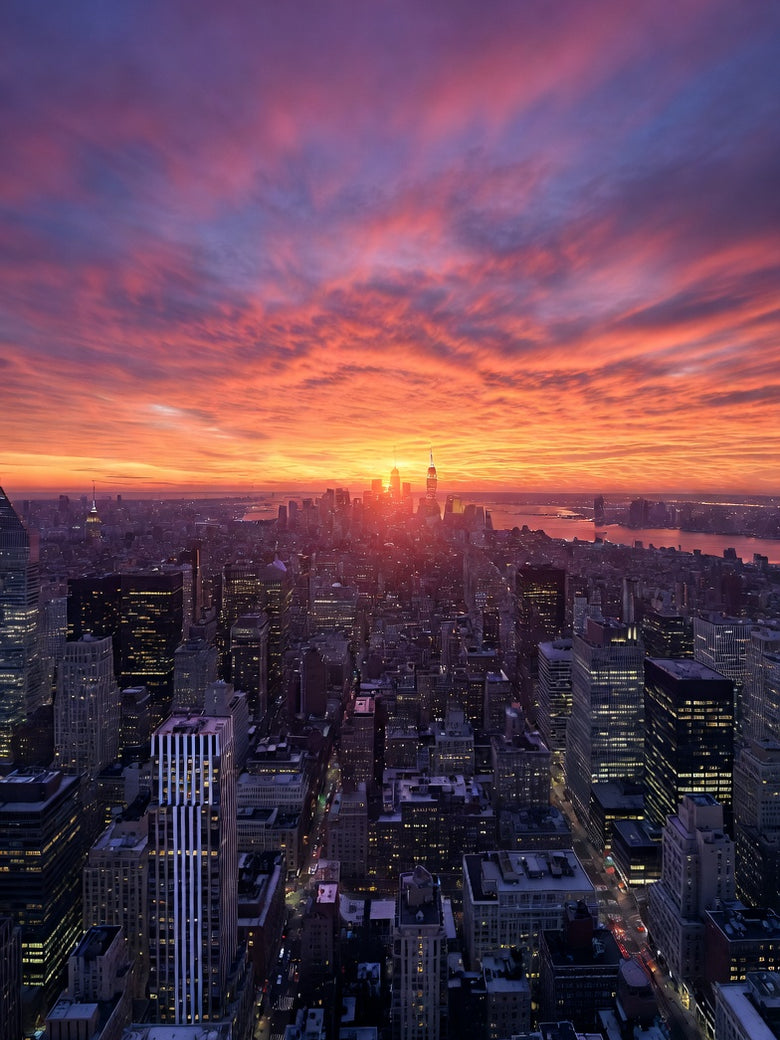 Skyline After Rain — a neon city seen from above